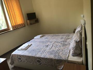 Фото номера Апартаменты с 2 спальнями Отель Sunny Paradise Family Hotel г. Китен 3